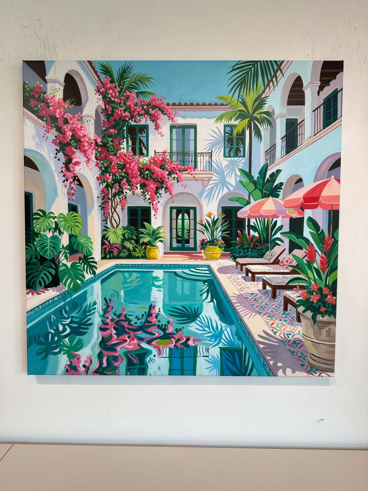 Beneath the bougainvillea balcony