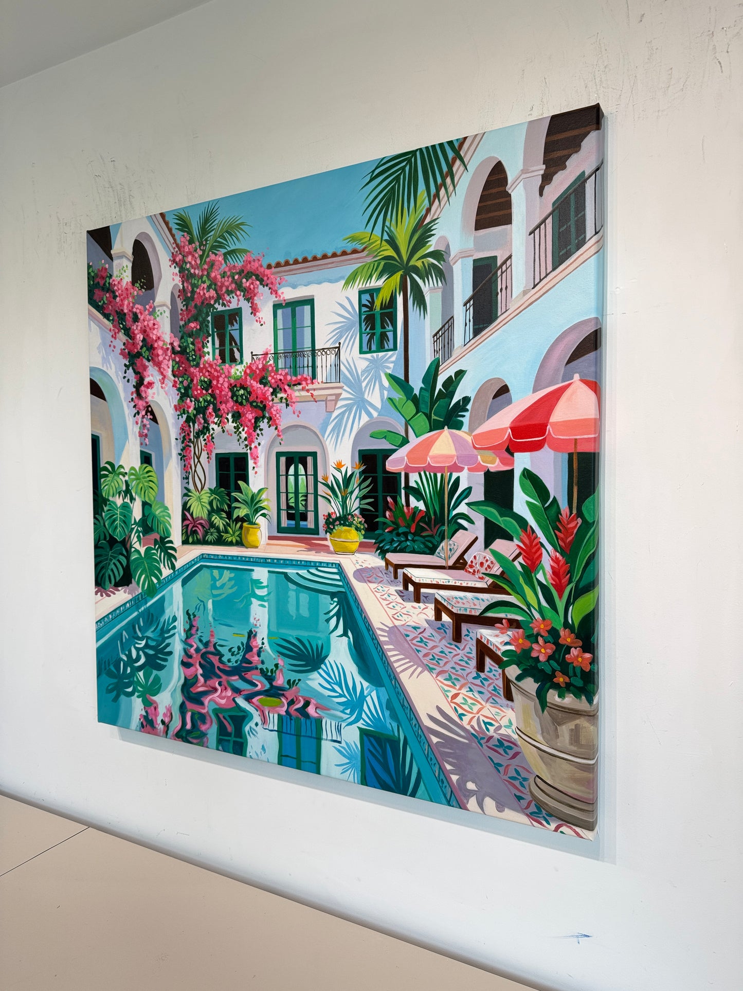 Beneath the bougainvillea balcony