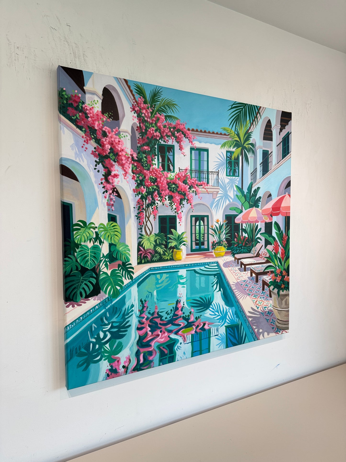 Beneath the bougainvillea balcony