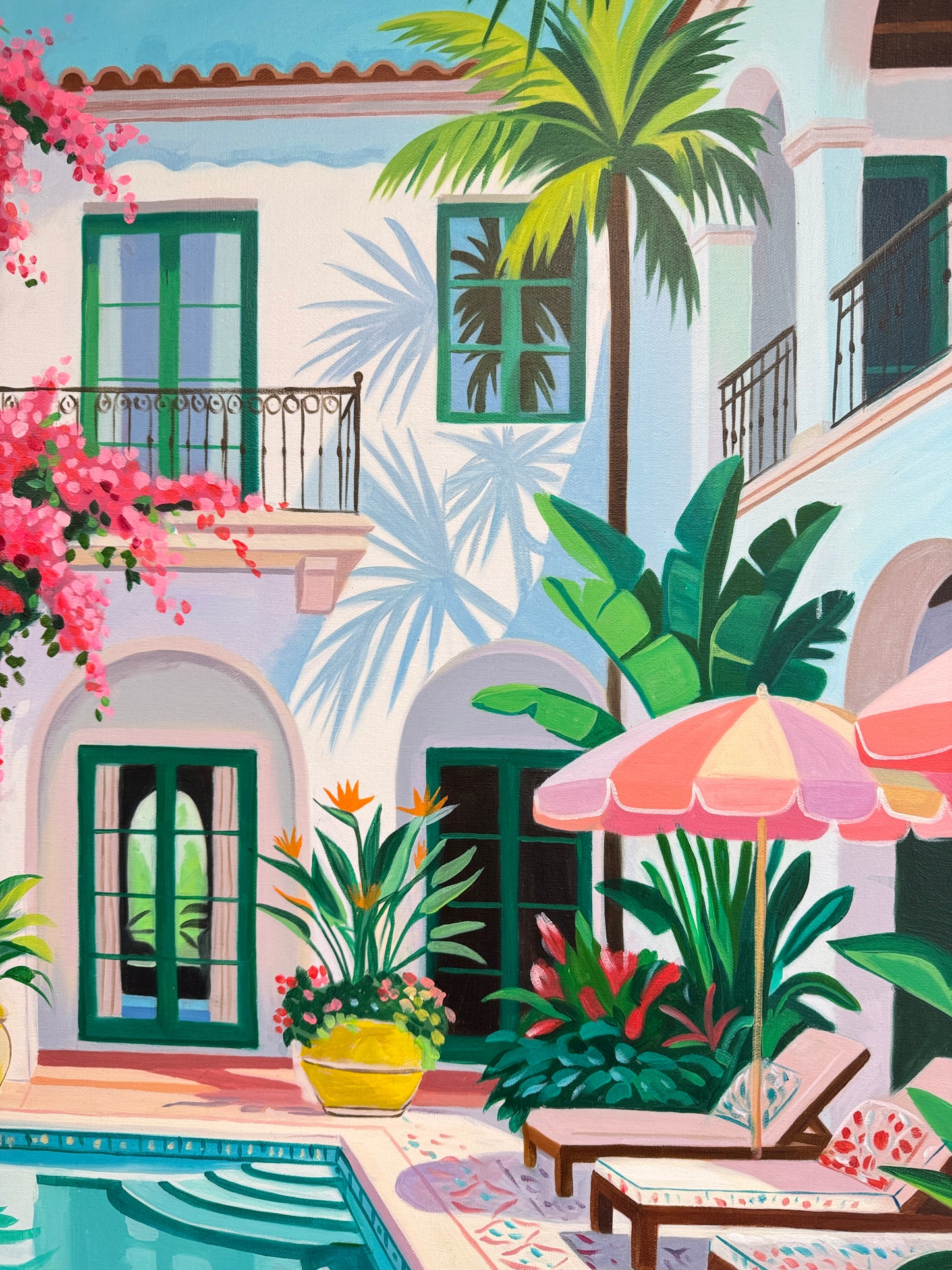 Beneath the bougainvillea balcony