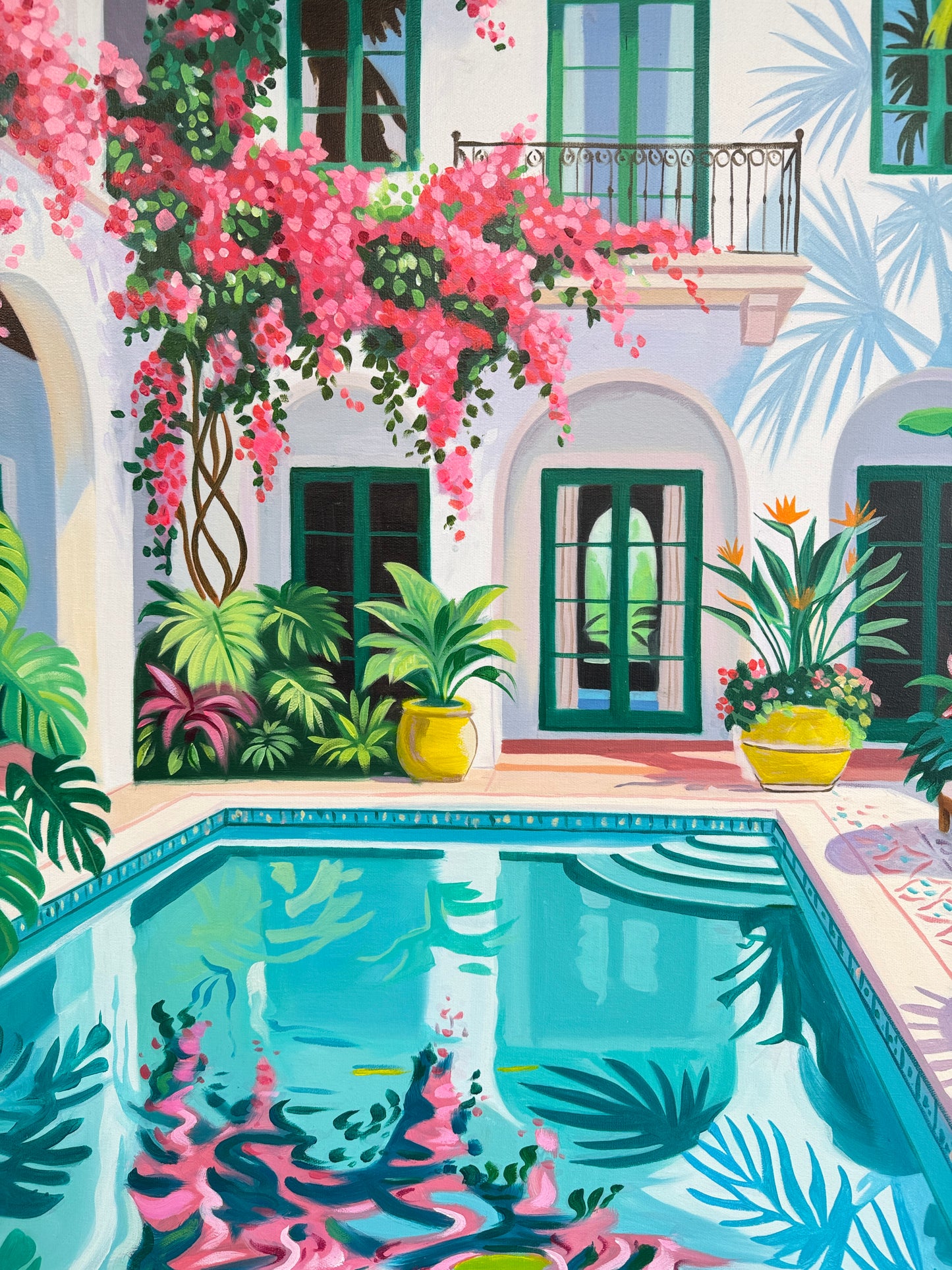 Beneath the bougainvillea balcony